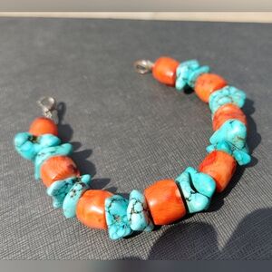 Blue and Red Beaded Bracelet with Natural Texture